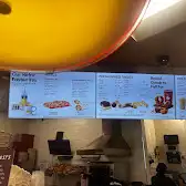 Tim Hortons storefront and interior at 1485 Elgin Mills East, Richmond Hill, ON