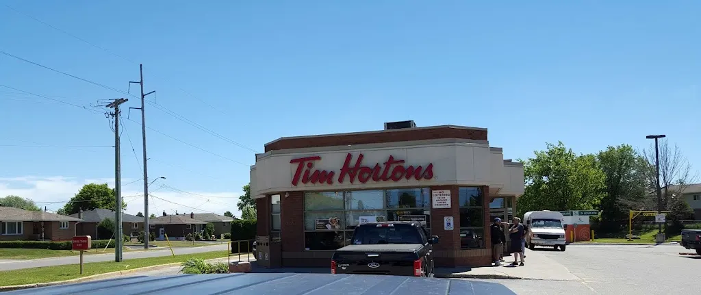 Tim Hortons storefront and interior at 223 2nd Line West, Sault Ste Marie, ON
