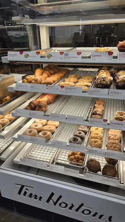 Tim Hortons storefront and interior at 4000 Finch Ave East, Scarborough, ON