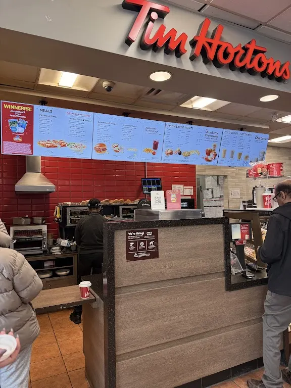 Tim Hortons storefront and interior at 5975 Steeles Ave E, Scarborough, ON