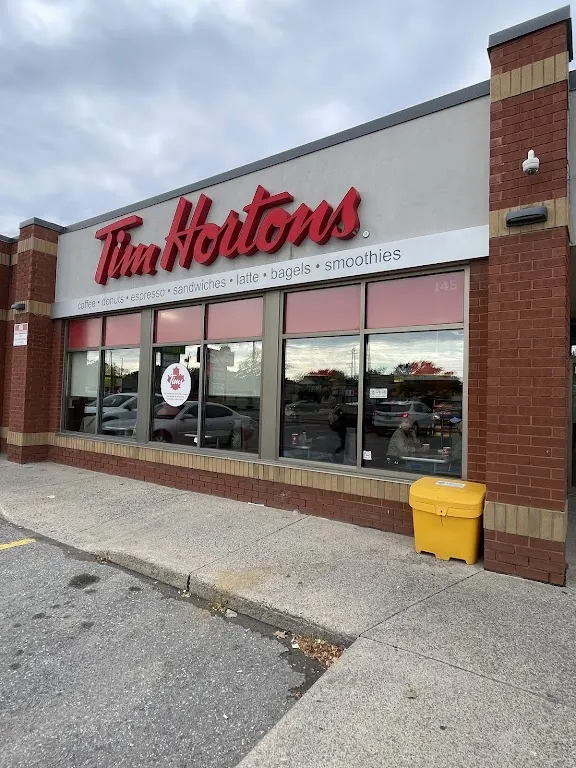 Tim Hortons storefront and interior at 145 Hartzel Rd, St Catharines, ON
