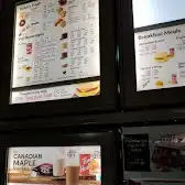 Tim Hortons storefront and interior at 170 4th Ave South, St Catharines, ON