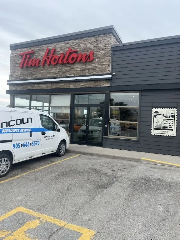 Tim Hortons storefront and interior at 211 Louth St, St Catharines, ON