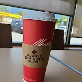 Tim Hortons storefront and interior at 275 Geneva St, St Catharines, ON