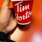 Tim Hortons storefront and interior at 201 Queen St, St Marys, ON