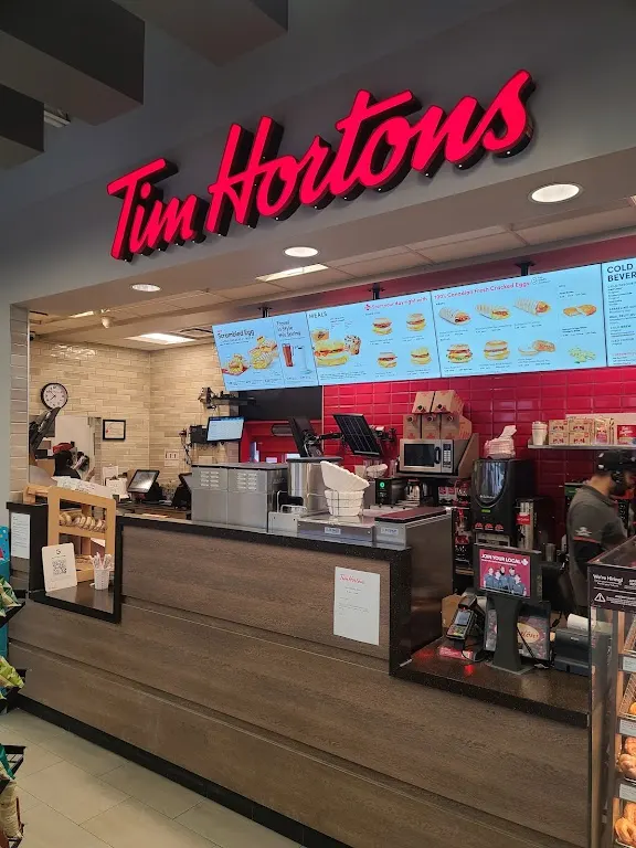 Tim Hortons storefront and interior at 225 Huntmar Dr, Stittsville, ON