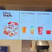 Tim Hortons storefront and interior at 225 Huntmar Dr, Stittsville, ON