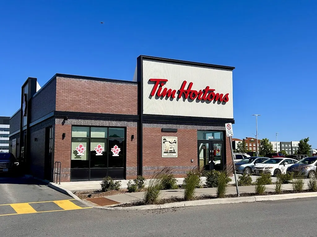 Tim Hortons storefront and interior at 3025 Palladium Drive, Stittsville, ON