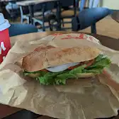 Tim Hortons storefront and interior at 3025 Palladium Drive, Stittsville, ON