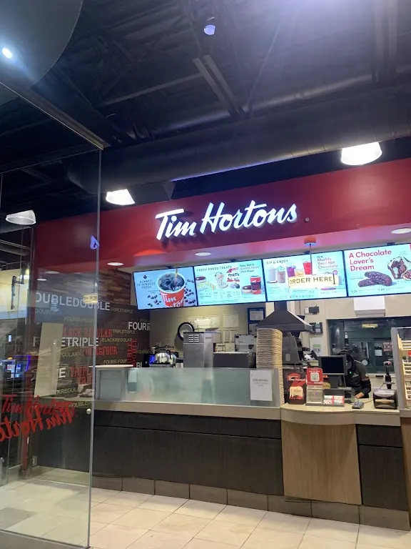 Tim Hortons storefront and interior at 6061 Hazeldean Rd, Stittsville, ON