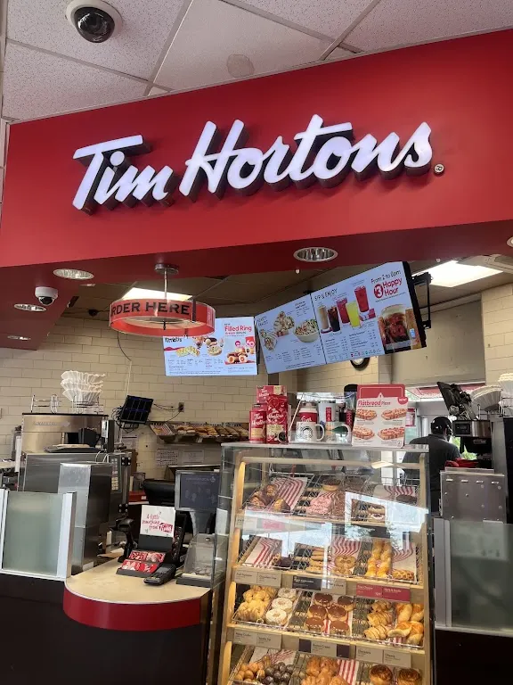 Tim Hortons storefront and interior at 249 Highway 20 South, Stoney Creek, ON