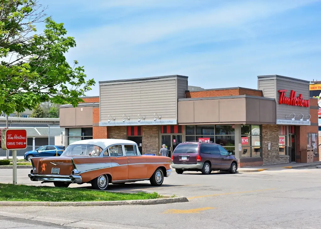 Tim Hortons storefront and interior at 35 Ormond St North, Thorold, ON