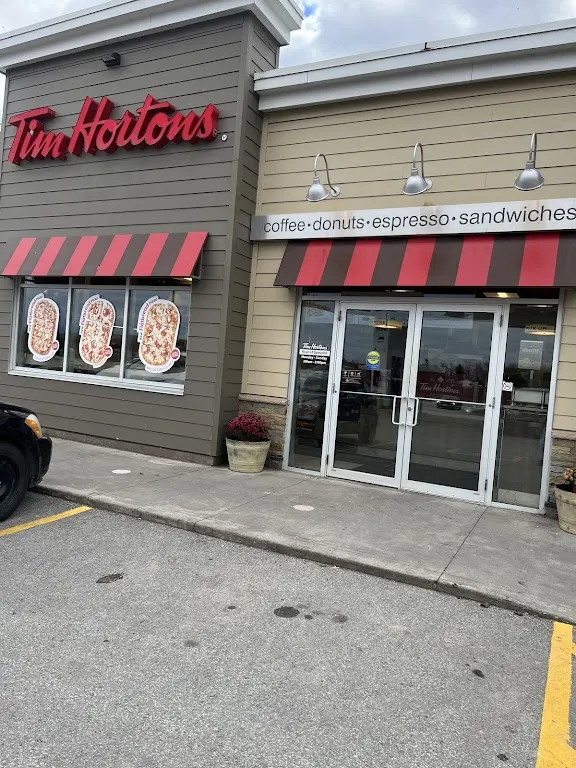 Tim Hortons storefront and interior at 1040 Thorold Stone Rd, Thorold, ON