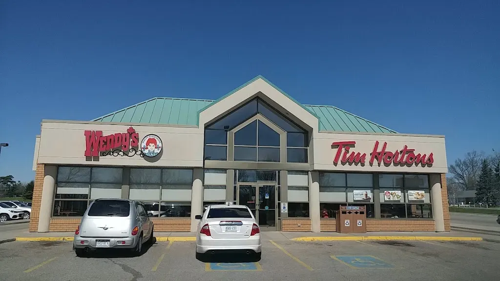 Tim Hortons storefront and interior at 401 Simcoe St, Tillsonburg, ON
