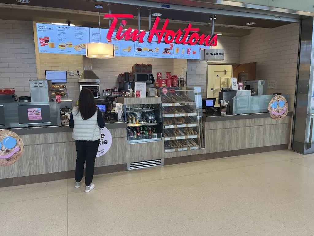 Tim Hortons storefront and interior at 1 Bridgepoint Dr., Toronto, ON