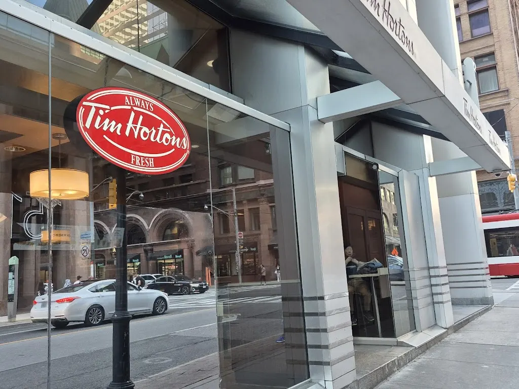 Tim Hortons storefront and interior at 1 Richmond St West, Toronto, ON