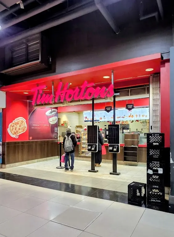Tim Hortons storefront and interior at 10 Dundas St E  Suite 104, Toronto, ON