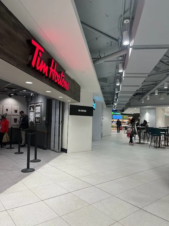 Tim Hortons storefront and interior at 20 Eglinton Ave West, Toronto, ON