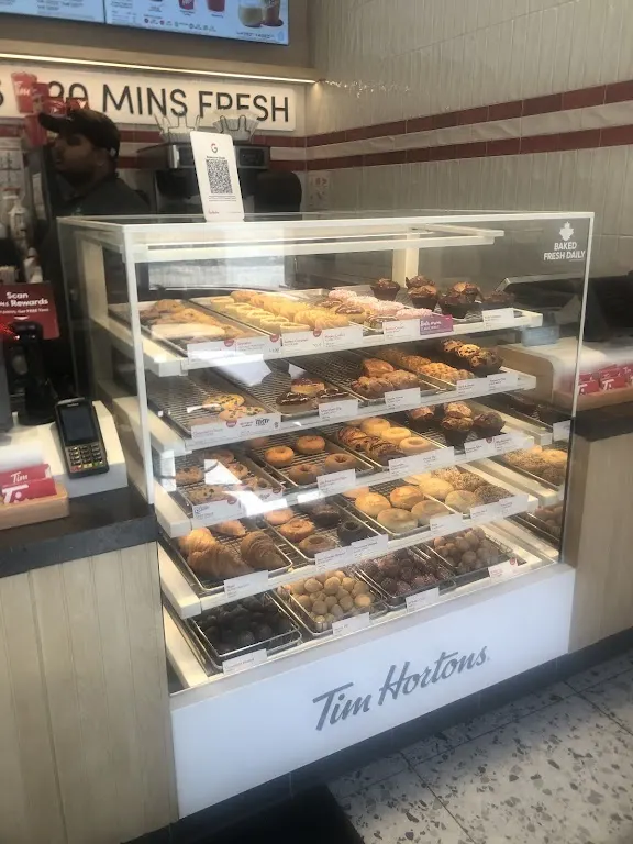 Tim Hortons storefront and interior at 28 Downes Street, Toronto, ON
