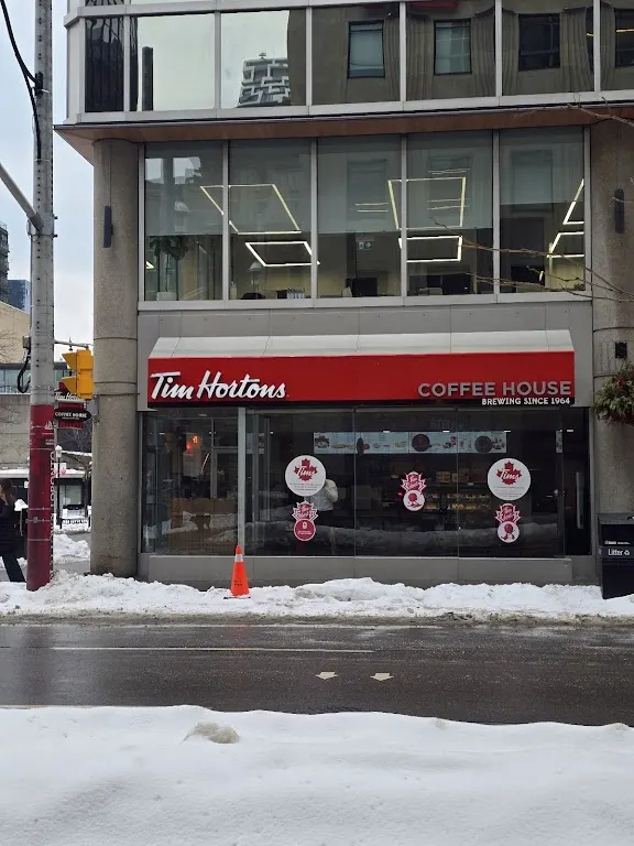 Tim Hortons storefront and interior at 33 Yonge St, Toronto, ON