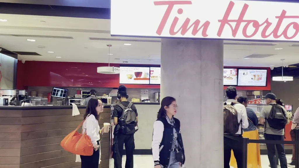 Tim Hortons storefront and interior at 65 Front Street - Via Concourse, Toronto, ON