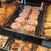Tim Hortons storefront and interior at 150 Wynford Dr, Toronto, ON