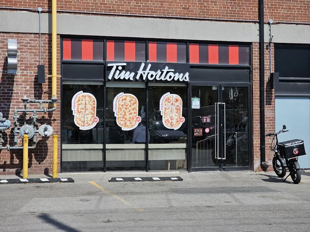 Tim Hortons storefront and interior at 171 East Liberty St, Toronto, ON