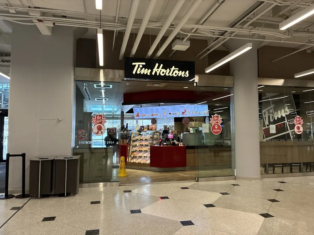 Tim Hortons storefront and interior at 207 Queens Quay, Toronto, ON