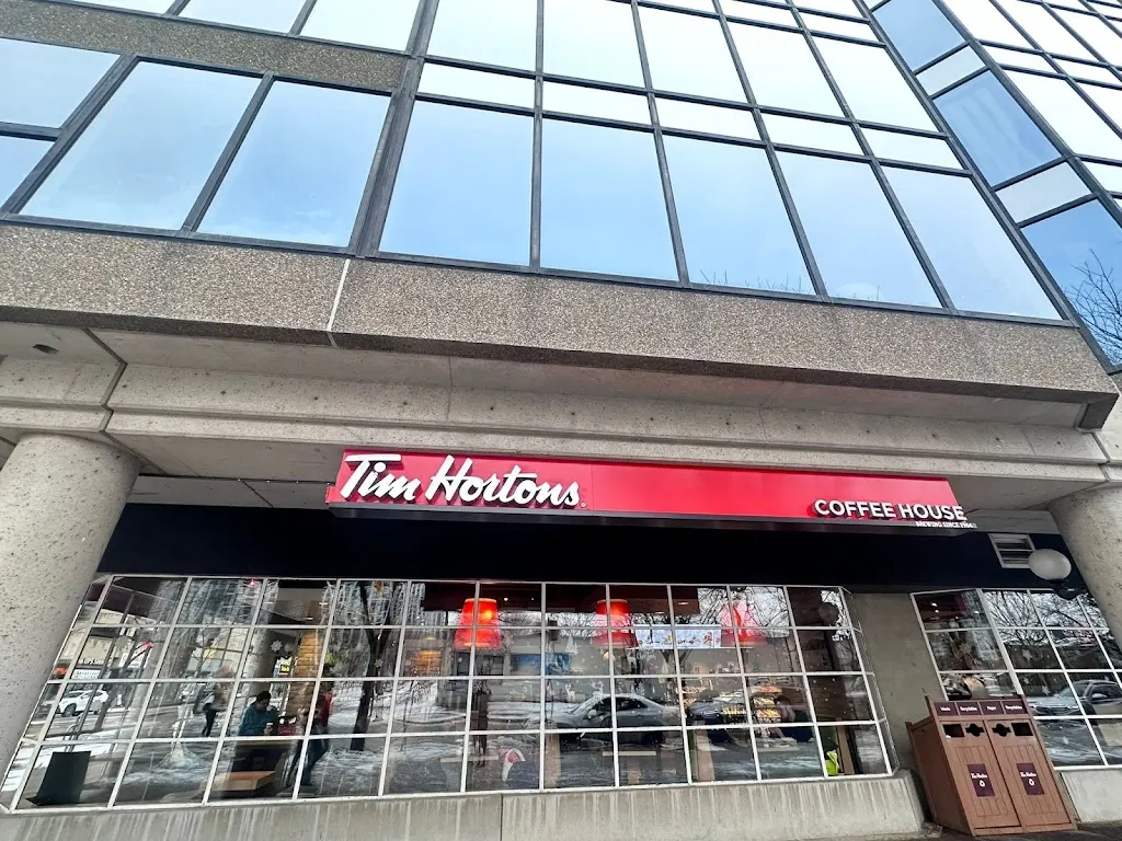 Tim Hortons storefront and interior at 249 Queens Quay West, Toronto, ON