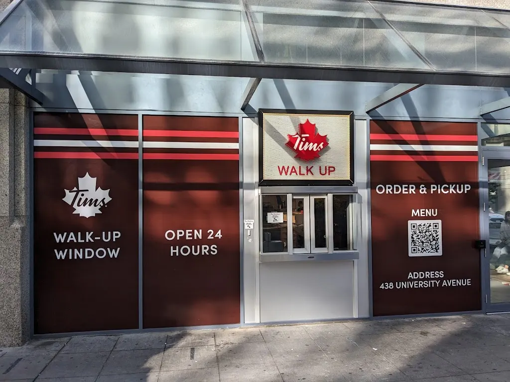 Tim Hortons storefront and interior at 438 University Ave, Toronto, ON
