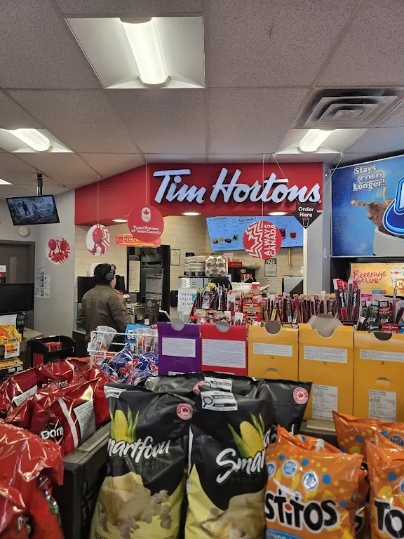 Tim Hortons storefront and interior at 561 O' Connor Dr, Toronto, ON