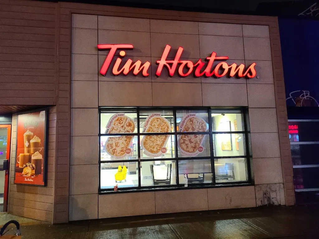 Tim Hortons storefront and interior at 659 Queen St W, Toronto, ON
