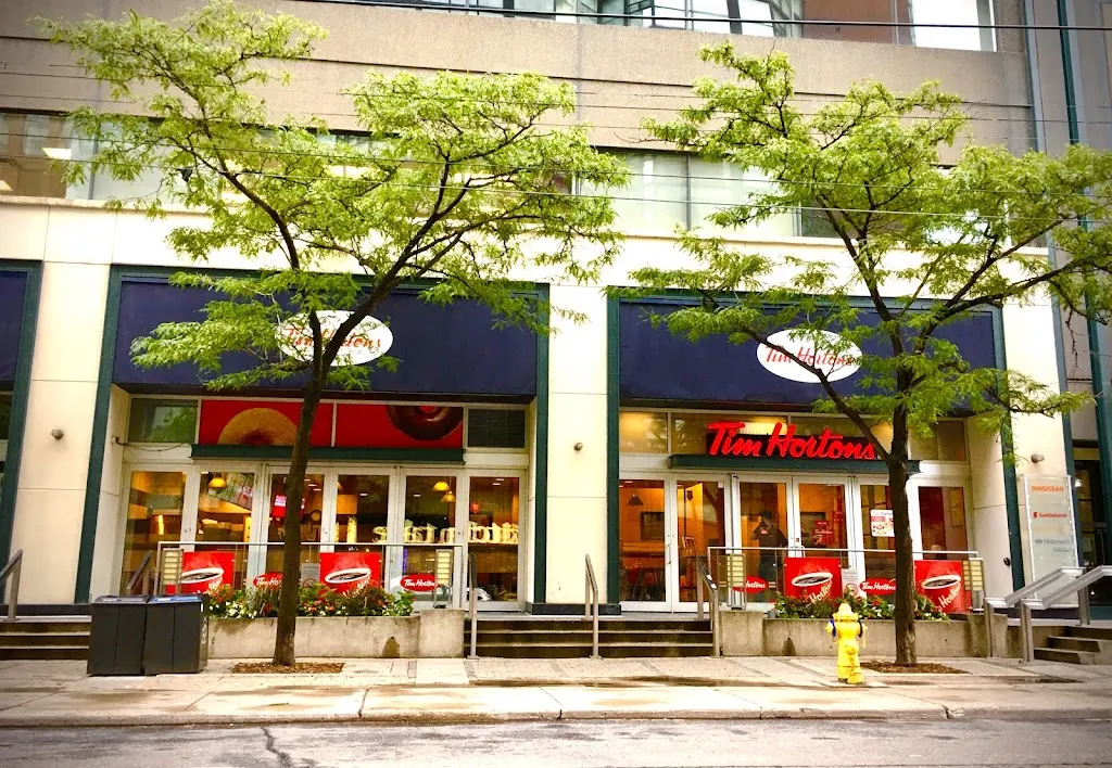 Tim Hortons storefront and interior at 720 King St West, Toronto, ON
