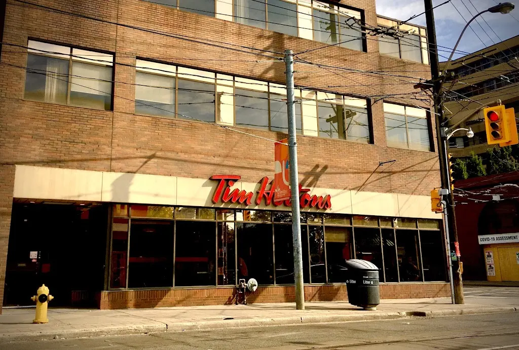 Tim Hortons storefront and interior at 750 Dundas St West, Toronto, ON