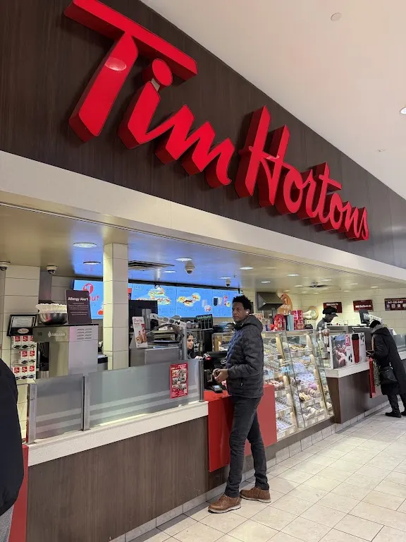 Tim Hortons storefront and interior at 900 Dufferin St., Toronto, ON