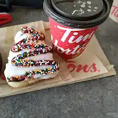 Tim Hortons storefront and interior at 1728 Bloor St West, Toronto, ON