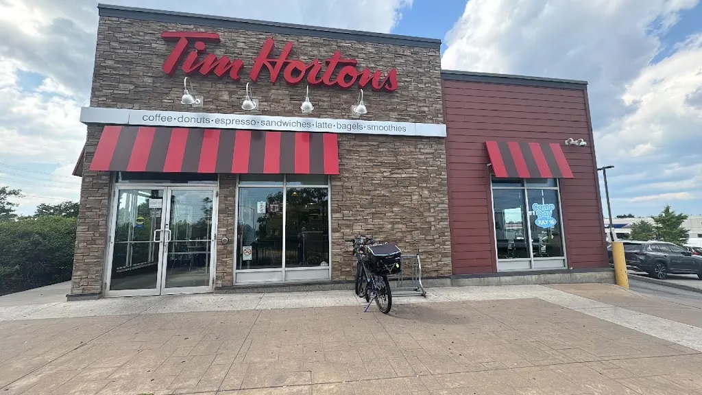 Tim Hortons storefront and interior at 2825 Markham Rd &amp; Mcnicoll Ave, Toronto, ON