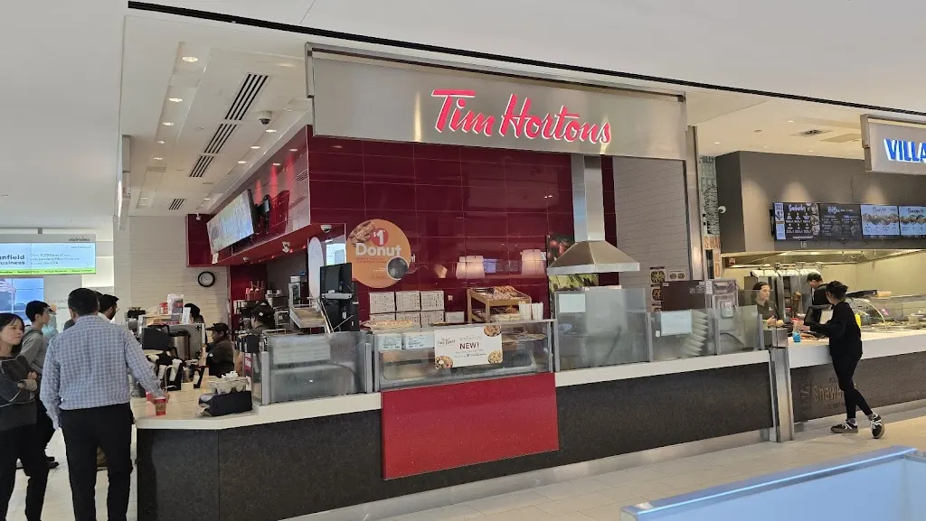 Tim Hortons storefront and interior at Waterpark Place, Toronto, ON