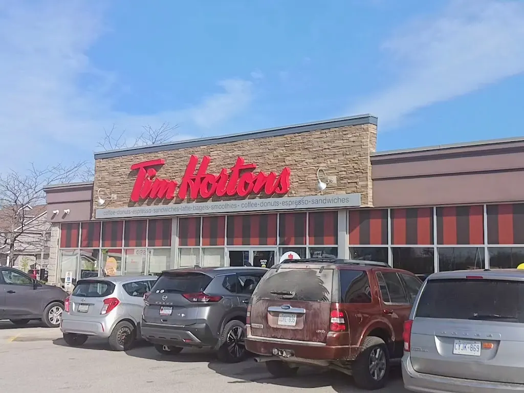 Tim Hortons storefront and interior at 1900 Mosley St, Wasaga Beach, ON