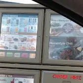 Tim Hortons storefront and interior at 30 Rice Rd, Welland, ON