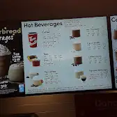 Tim Hortons storefront and interior at 90 Lincoln Ave, Welland, ON