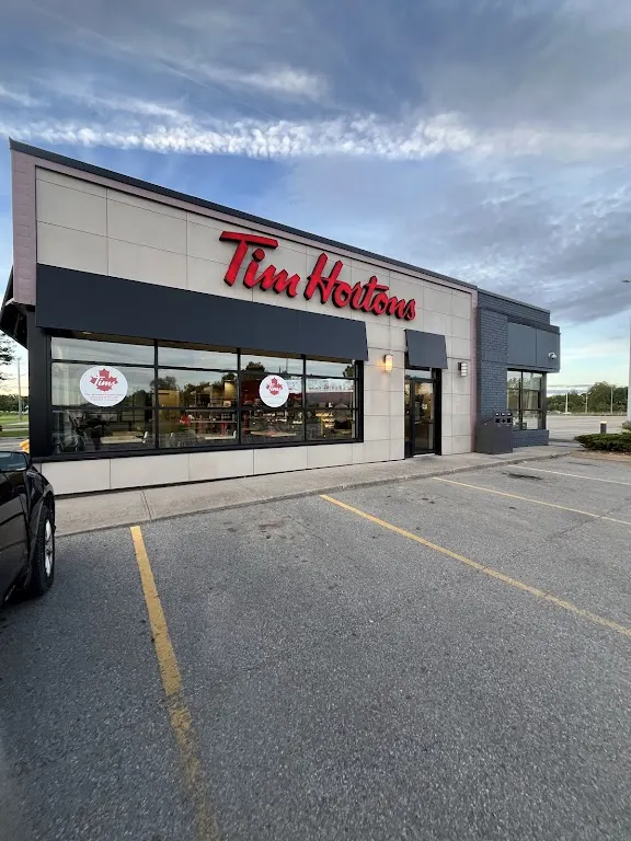 Tim Hortons storefront and interior at 990 East Main St, Welland, ON