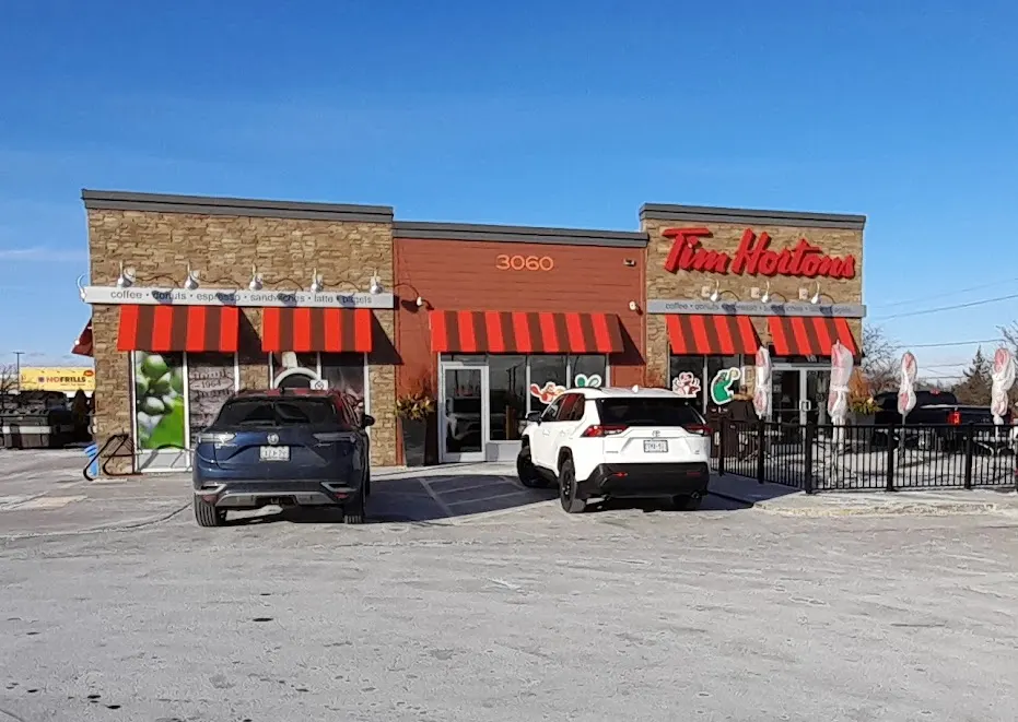 Tim Hortons storefront and interior at 3060 Garden St, Whitby, ON