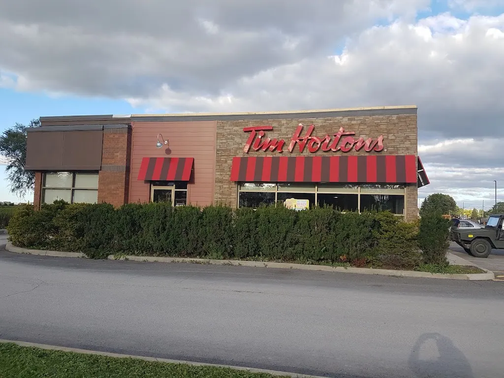 Tim Hortons storefront and interior at 12105 Main St, Winchester, ON