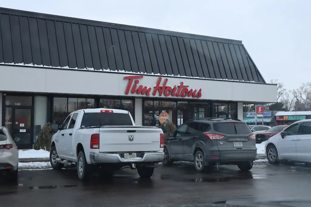 Tim Hortons storefront and interior at 3850 Dougall Ave, Windsor, ON