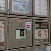 Tim Hortons storefront and interior at 857 Devonshire Ave, Woodstock, ON
