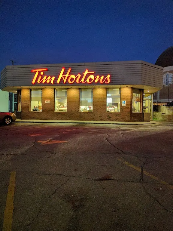 Tim Hortons storefront and interior at 31 Rue Principale Nord, Amos, QC