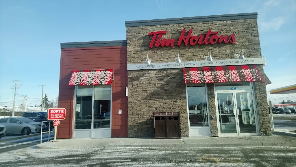 Tim Hortons storefront and interior at 311 6e Rue Ouest, Amos, QC