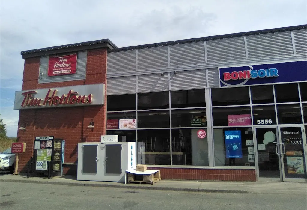 Tim Hortons storefront and interior at 5556 Route 112, Ascot Corner, QC