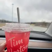 Tim Hortons storefront and interior at 5556 Route 112, Ascot Corner, QC